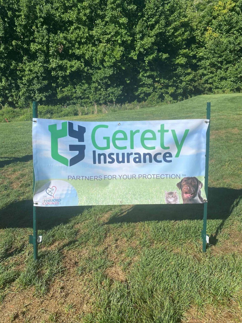 Gerety Insurance banner on grass
