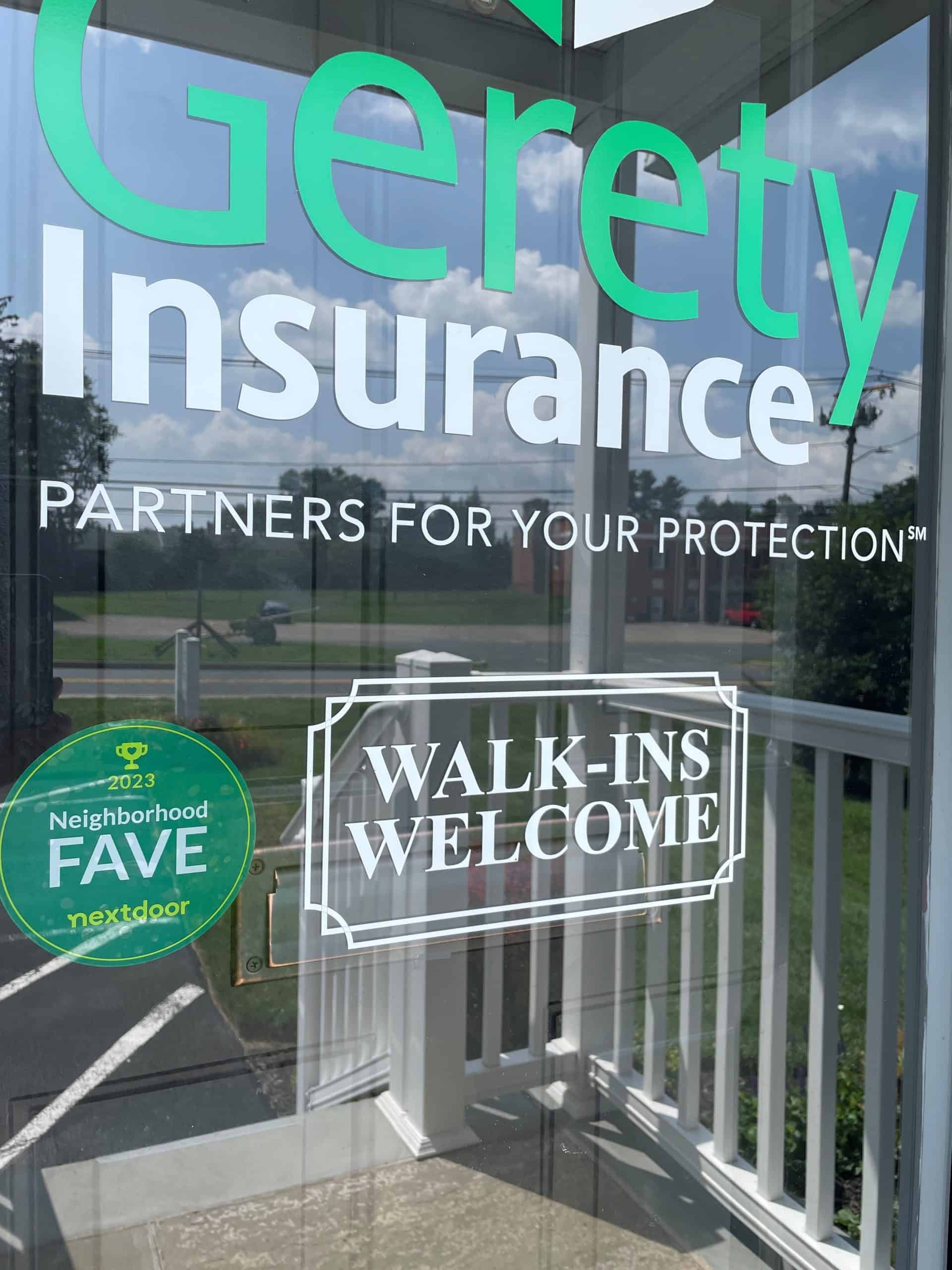 Gerety Insurance glass door showing WALK-INS WELCOME decal.