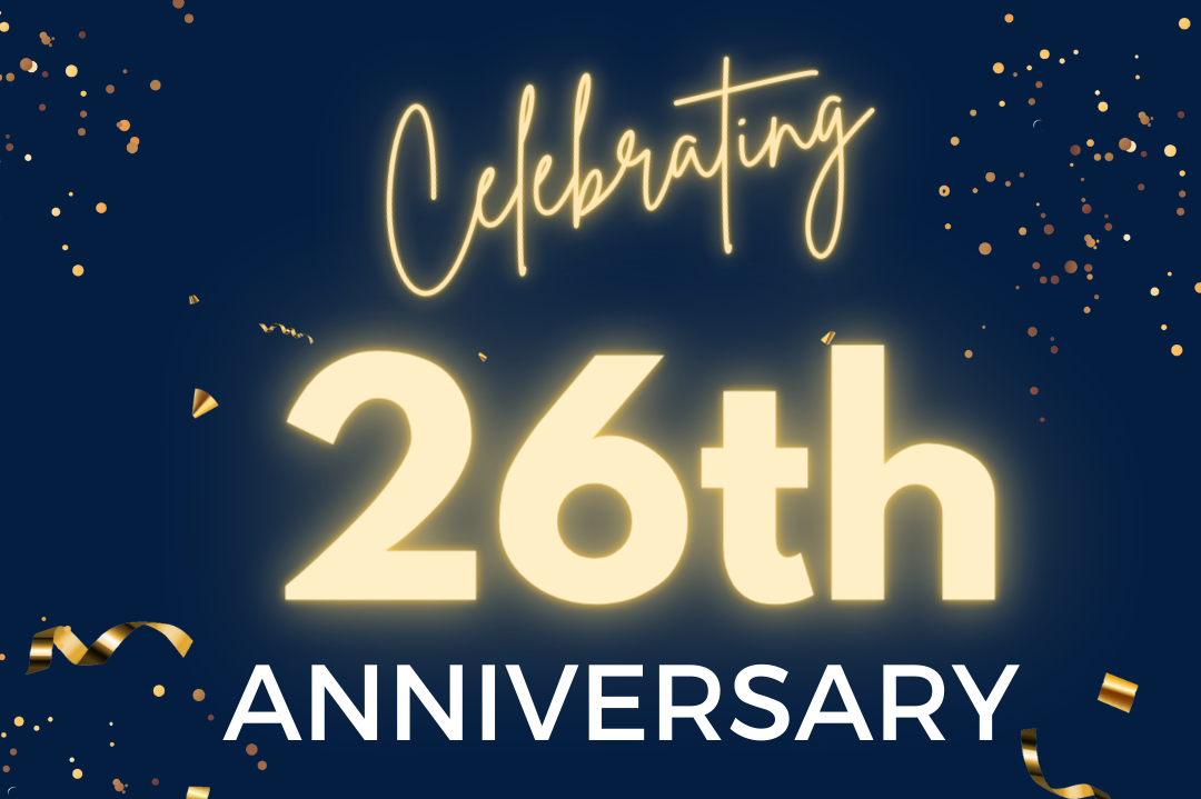 Glowing 'Celebrating 26th Anniversary' text with gold confetti on navy background