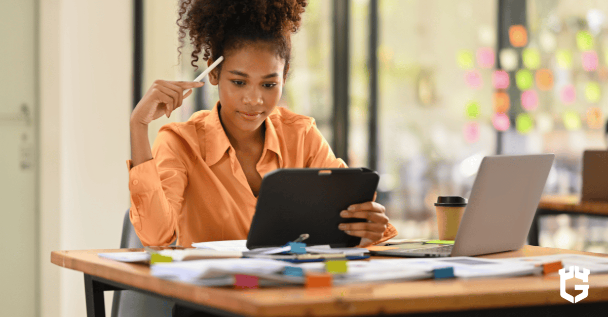 Woman researching insurance carriers on a tablet