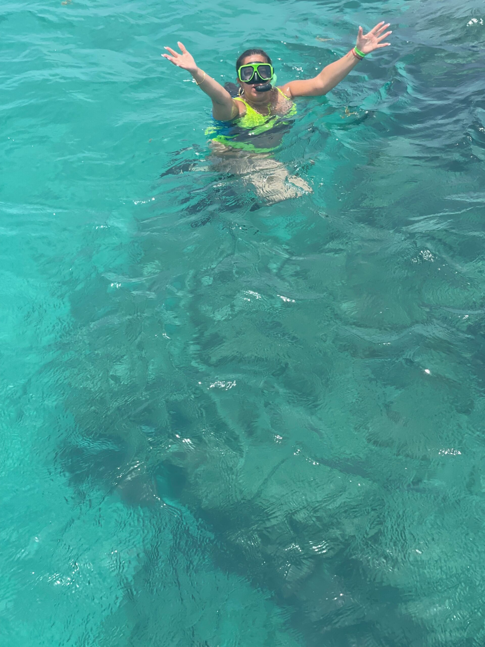 Margarita Rodriguez snorkeling in clear turquoise water