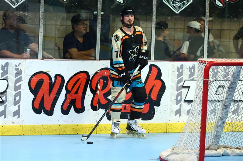 Nick Foster playing hockey