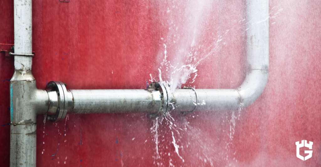 Water spraying from a burst household pipe